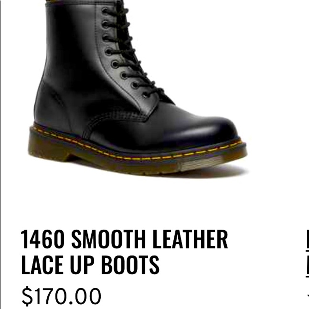 Dr.Martens boots, size 7, black in color with some yellow.